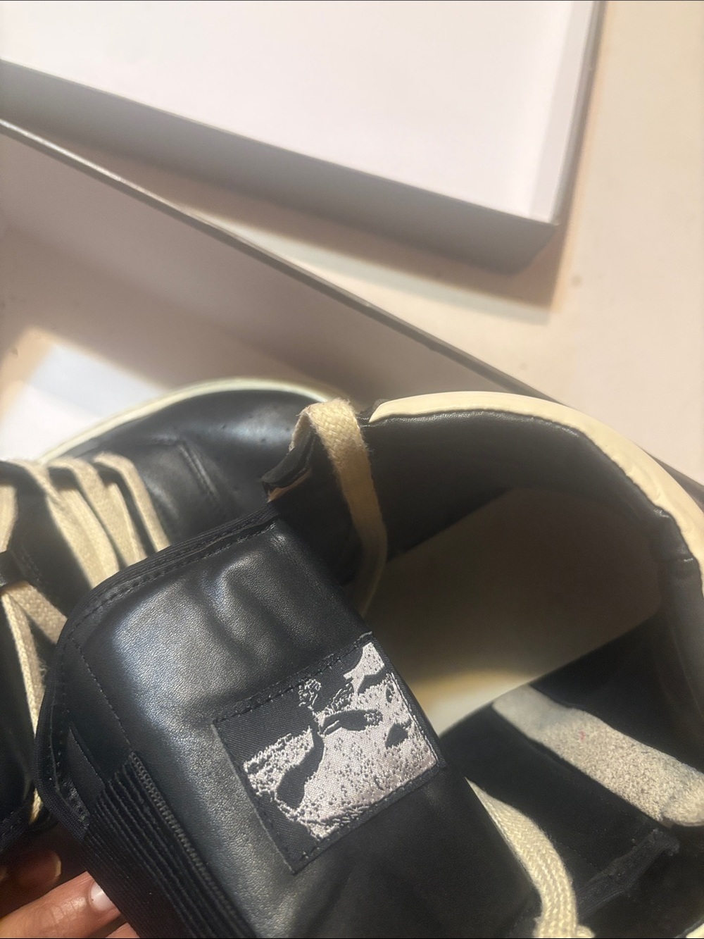 Rick Owens Black and Cream High-Top Sneaker